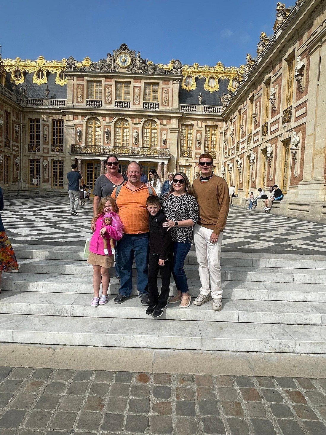 Family visiting Versailles
